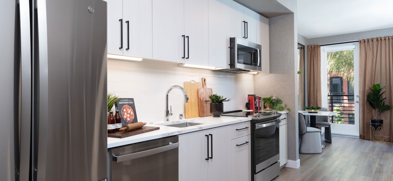 Spacious kitchens with thoughtful details kitchen with stainless steel appliances and white cabinets