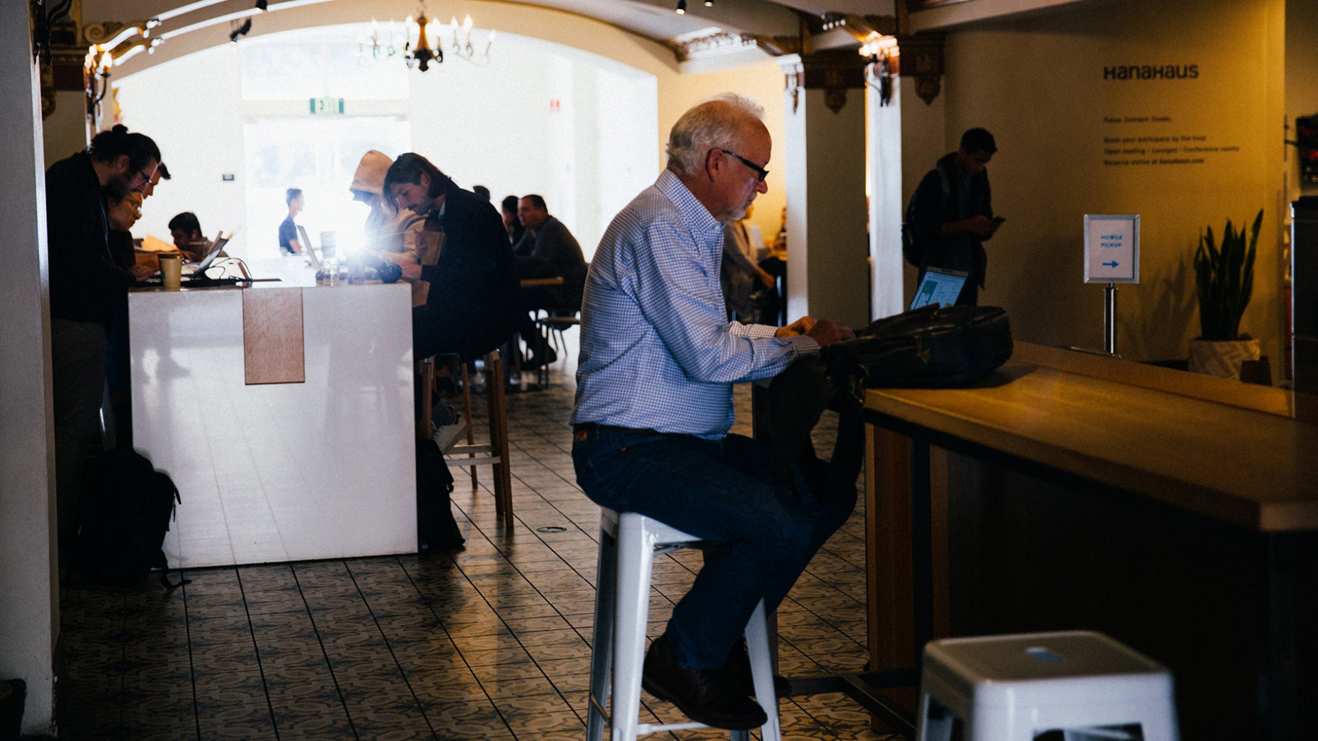 man sitting at a cafe